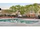 Community pool with lounge chairs, perfect for relaxation at 2411 Vancastle Way # 202, Raleigh, NC 27617