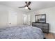 Bedroom with a comfortable bed, dresser with a mirror, and a closet with sliding doors at 2522 N Roxboro St, Durham, NC 27704