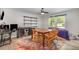 Dining area featuring a colorful rug and bright light from the adjacent window and exterior view at 2522 N Roxboro St, Durham, NC 27704