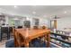 Bright dining room with modern lighting, seamlessly connecting to the kitchen and living areas at 2522 N Roxboro St, Durham, NC 27704
