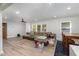 Open concept living room with hardwood floors, ample natural light, and seamless flow to other living spaces at 2522 N Roxboro St, Durham, NC 27704