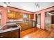 Classic kitchen with natural wood cabinetry and stainless steel appliances at 254 Pine Forest Dr, Siler City, NC 27344