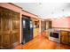 Traditional kitchen with wood cabinets, stainless steel appliances, and hardwood floors at 254 Pine Forest Dr, Siler City, NC 27344
