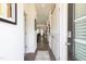 Inviting foyer with wood-look flooring and a view into the living spaces at 290 Deodora Ln, Cameron, NC 28326