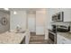 Kitchen features stainless steel appliances, white cabinets, granite countertops, and an undermount sink at 290 Deodora Ln, Cameron, NC 28326