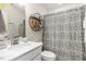 Charming bathroom with a decorative shower curtain, modern sink, and stylish decor at 301 White Oak Ridge Dr, Garner, NC 27529