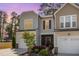 Charming home featuring a welcoming facade, landscaped yard, and attached garage at 301 White Oak Ridge Dr, Garner, NC 27529