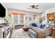 Comfortable living room with a cozy sofa, decorative accents, and lots of natural light from the windows at 301 White Oak Ridge Dr, Garner, NC 27529