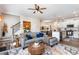 Spacious living room with stairs showcases an open floor plan that seamlessly connects to the kitchen and dining area at 301 White Oak Ridge Dr, Garner, NC 27529