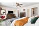 Spacious main bedroom with walk-in closet and sitting area offers a peaceful retreat for rest and relaxation at 301 White Oak Ridge Dr, Garner, NC 27529