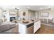 Modern kitchen with granite countertops, stainless steel appliances, and an open layout at 322 Bluejay St, Clayton, NC 27520