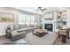 Comfortable living room with a fireplace, built-in shelves, and ample natural light at 322 Bluejay St, Clayton, NC 27520