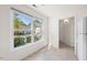 Bright dining area with large window and light ceramic flooring offers ample space and natural light at 359 Kilarney Dr, Durham, NC 27703