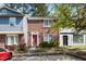Charming brick townhome with manicured landscaping, offering a warm and inviting curb appeal at 359 Kilarney Dr, Durham, NC 27703