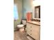 Bathroom featuring tile floors and a vanity with a granite top at 4159 Princeton Kenly Road, Kenly, NC 27542