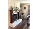 Cozy fireplace with a decorative mantel and brick surround, perfect for creating a warm ambiance at 4159 Princeton Kenly Road, Kenly, NC 27542