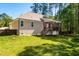 Charming home with a backyard and deck, providing the perfect space for outdoor relaxation and entertaining at 4290 Sustain Cir, Franklinton, NC 27525