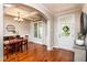 Dining room with coffered ceiling, hardwood floors, and natural light at 4290 Sustain Cir, Franklinton, NC 27525