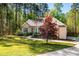 Well-maintained home featuring a vibrant front yard and a welcoming entrance with lovely landscaping at 4290 Sustain Cir, Franklinton, NC 27525
