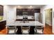 Kitchen featuring a center island with barstool seating and stainless steel appliances at 4290 Sustain Cir, Franklinton, NC 27525