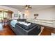 Spacious open-concept living room connects dining area and features built-in shelving at 4290 Sustain Cir, Franklinton, NC 27525