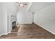 Bright living room featuring a fireplace, ceiling fan and hardwood floors at 501 Gooseneck Dr # B6, Cary, NC 27513