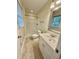 Bathroom features tile flooring, a shower and tub, and vanity with mirror at 508 & 510 Gordon St, Roxboro, NC 27573