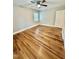 Bright bedroom features hardwood floors, ceiling fan, and natural light from the window at 508 & 510 Gordon St, Roxboro, NC 27573