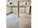 Spacious three-car garage with concrete floor and overhead door openers at 508 & 510 Gordon St, Roxboro, NC 27573