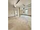 Open garage area featuring concrete floor and overhead lighting, perfect for storage or projects at 508 & 510 Gordon St, Roxboro, NC 27573