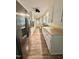 Spacious galley kitchen featuring stainless steel appliances and plenty of storage at 508 & 510 Gordon St, Roxboro, NC 27573
