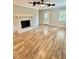 Bright living room with neutral walls, decorative fireplace and plenty of room to entertain at 508 & 510 Gordon St, Roxboro, NC 27573
