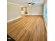 An open living room with hardwood floors, and neutral walls with ample natural light at 508 & 510 Gordon St, Roxboro, NC 27573