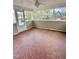 Inviting porch offering views of a charming neighborhood with mosaic tile flooring and natural light at 508 & 510 Gordon St, Roxboro, NC 27573