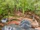 Aerial view of a home showing the back deck and wooded lot at 508 Baygall Rd, Holly Springs, NC 27540