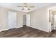 Spacious main bedroom featuring wood-look floors and an ensuite bathroom at 508 Baygall Rd, Holly Springs, NC 27540