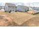 Spacious backyard with patio furniture, fire pit, and ample open space at 512 Oak Holly Ln, Zebulon, NC 27597