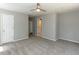 Spacious bedroom with overhead fan, neutral walls and plush carpet at 519 Touchstone Dr, Durham, NC 27713