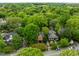 Areal view of a home in lush tree lined neighborhood offering serenity and seclusion at 524 S Boylan Ave, Raleigh, NC 27603