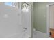 Clean bathroom featuring a white bathtub with modern fixtures and well-maintained tiles at 524 S Boylan Ave, Raleigh, NC 27603