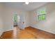 Inviting bedroom with natural light, beautiful hardwood floors and neutral paint palette at 524 S Boylan Ave, Raleigh, NC 27603
