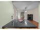 Bright kitchen with island and view to the living room at 524 S Boylan Ave, Raleigh, NC 27603