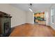 Spacious living room with hardwood floors and an open doorway to the kitchen at 524 S Boylan Ave, Raleigh, NC 27603