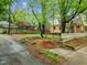 Residential street scene with mature trees, showcasing the home's setting within a neighborhood at 524 S Boylan Ave, Raleigh, NC 27603