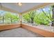 Relaxing covered porch with lovely wood trim detailing offers an excellent space for outdoor enjoyment at 524 S Boylan Ave, Raleigh, NC 27603