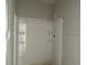 New bathroom featuring a stand-up shower with shelving and minimalist fixtures at 54 Grove Township Way, Angier, NC 27501