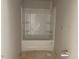 Unfinished bathroom featuring shower and tub, ready to be personalized at 54 Grove Township Way, Angier, NC 27501