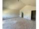 Bright bedroom space with walk-in closet, awaiting personalization and finishing touches at 54 Grove Township Way, Angier, NC 27501