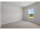 Cozy bedroom featuring a large window that provides ample natural light at 54 Grove Township Way, Angier, NC 27501