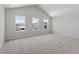 Spacious and well lit bonus room with high ceilings and large windows to backyard view at 54 Grove Township Way, Angier, NC 27501